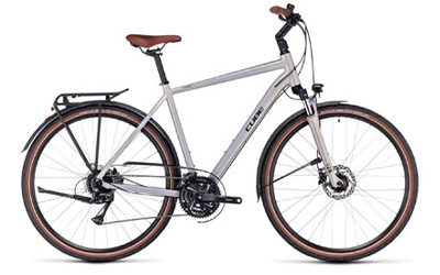Vélo de randonnée Cube Touring avec cadre diamant argenté.