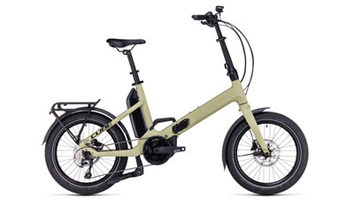 On voit ici un vélo électrique Cube Fold Hybrid 500 de couleur beige. 
